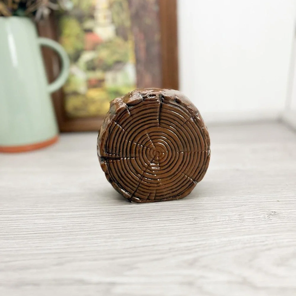 Vintage Ceramic Butterfly Piggy Bank: Kitschy Wood Log Decor